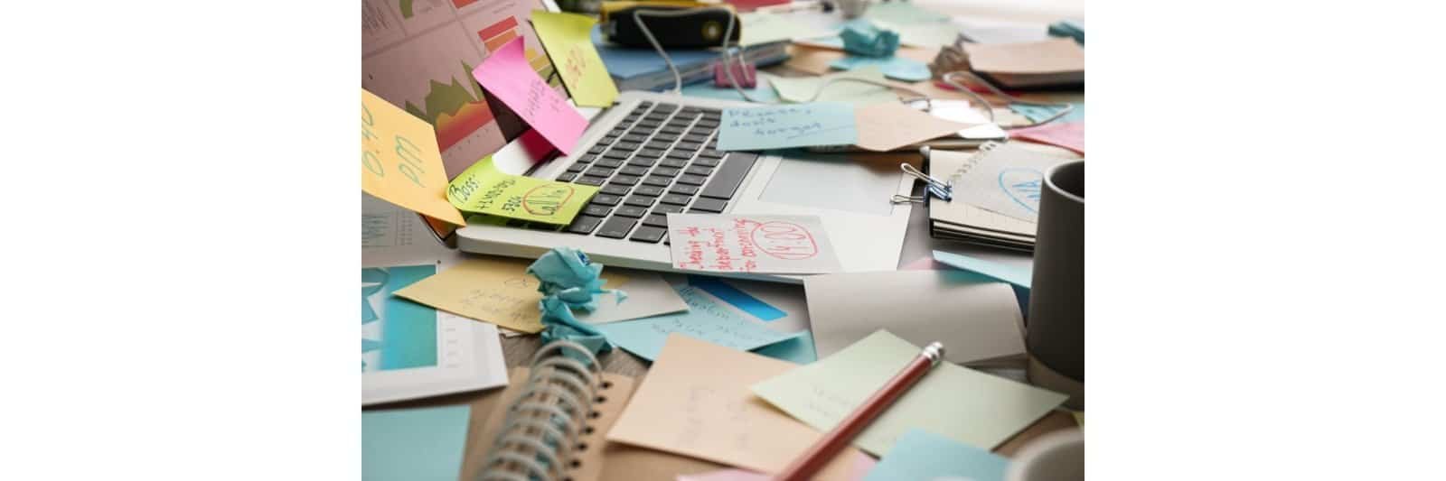 2-minute rule productivity - cluttered desk with small tasks