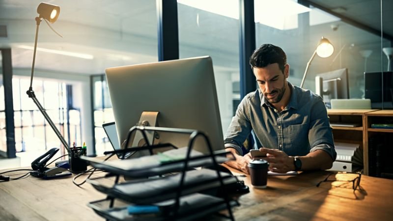 Man concentrating at work, illustrating the power of focusing on one big task
