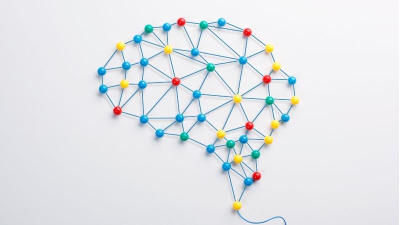 Abstract graphic of a brain's connections, illustrating the dopamine reward of prioritising tasks using the 1-3-5 rule