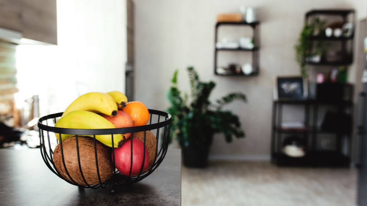 Healthy kitchen with visible nutritious food showing environment design habits